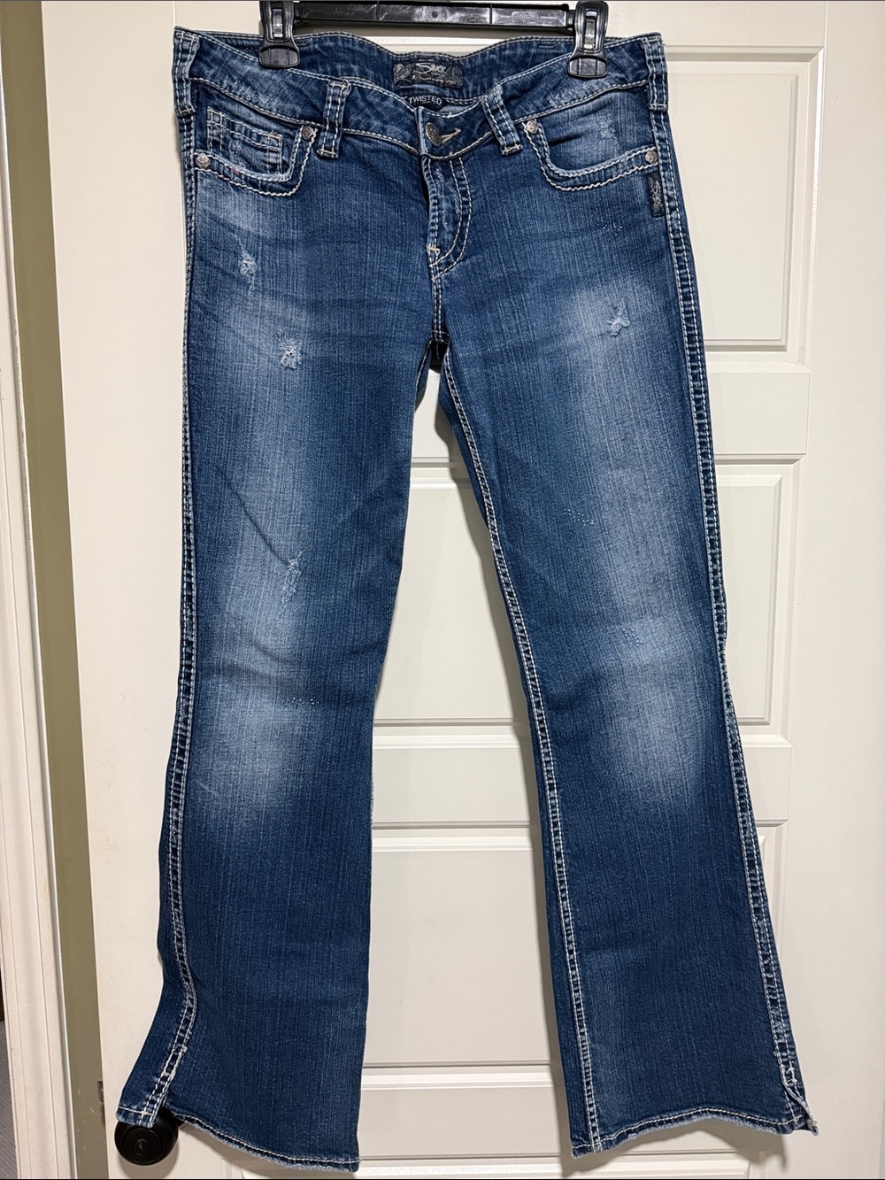 Silver Jeans Dark Medium Blue Flare Jeans with Subtle Distress 32x33